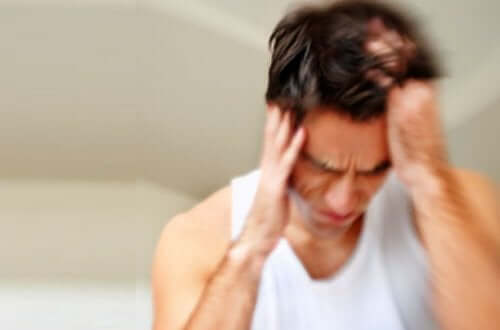 A man with a migraine.
