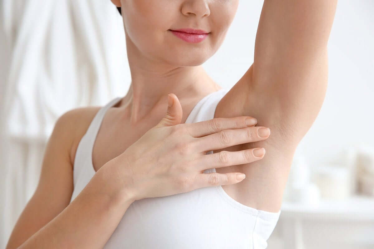 A woman with shaved armpits.