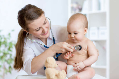 A doctor examining a child.