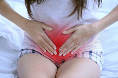 A woman experiencing cramps.