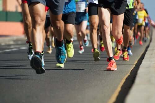 A large group of runners running a marathon.