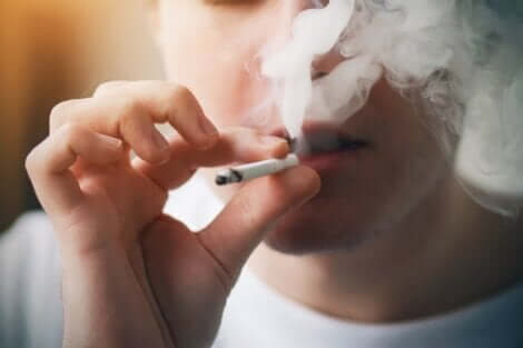 A person smoking.