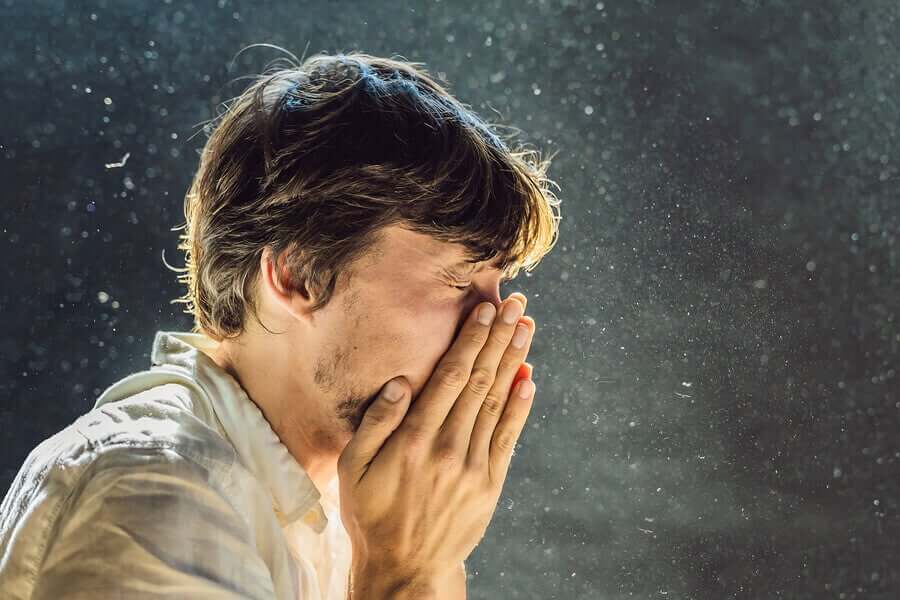 A man sneezing.