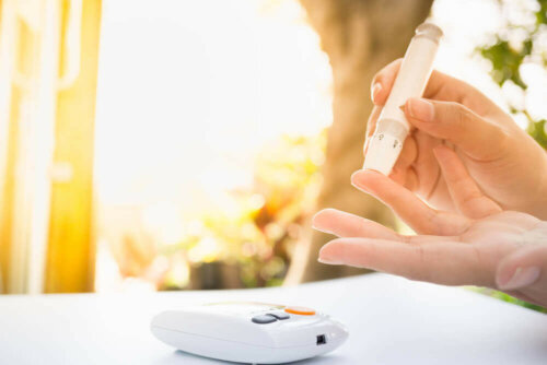 A person testing their blood sugar levels.