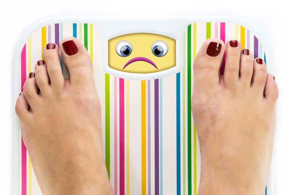 A woman on a scale.