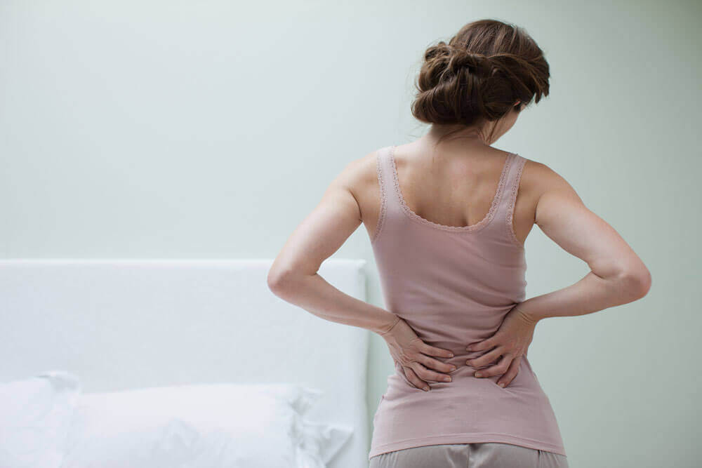A woman with body pain.