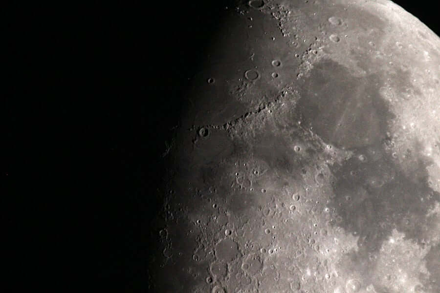 Craters on the surface of the moon.