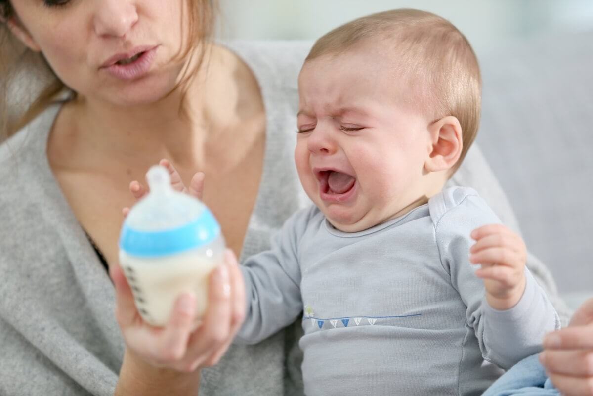 A baby may be hungry if crying.