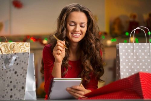Völlerei an Weihnachten - Frau mit einem Notizblock