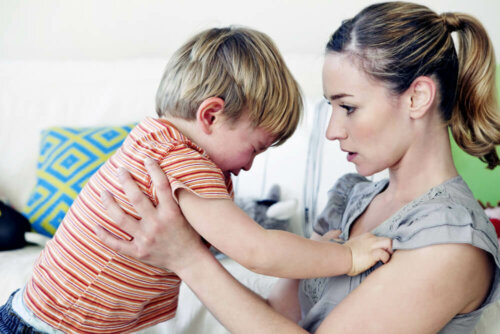 A little boy throwing a tantrum.