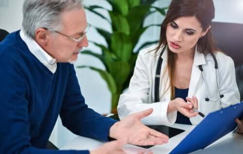 A man consulting a doctor.