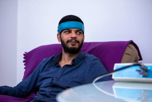 A man undergoing a stress relaxation technique.