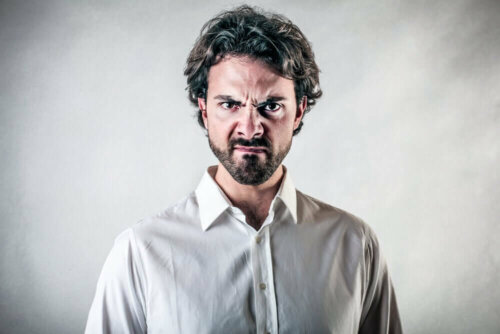 A man undergoing an angry outburst.