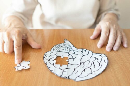 A person piecing a brain puzzle together.
