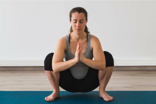A woman doing yoga.