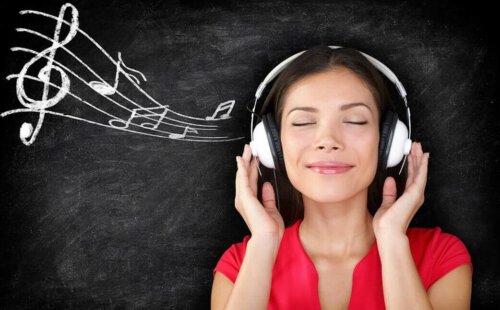 A woman listening to music.