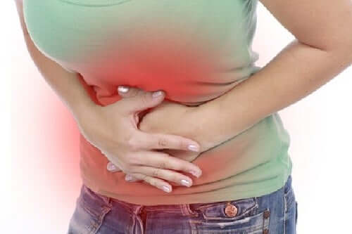 A woman with stomach pain.