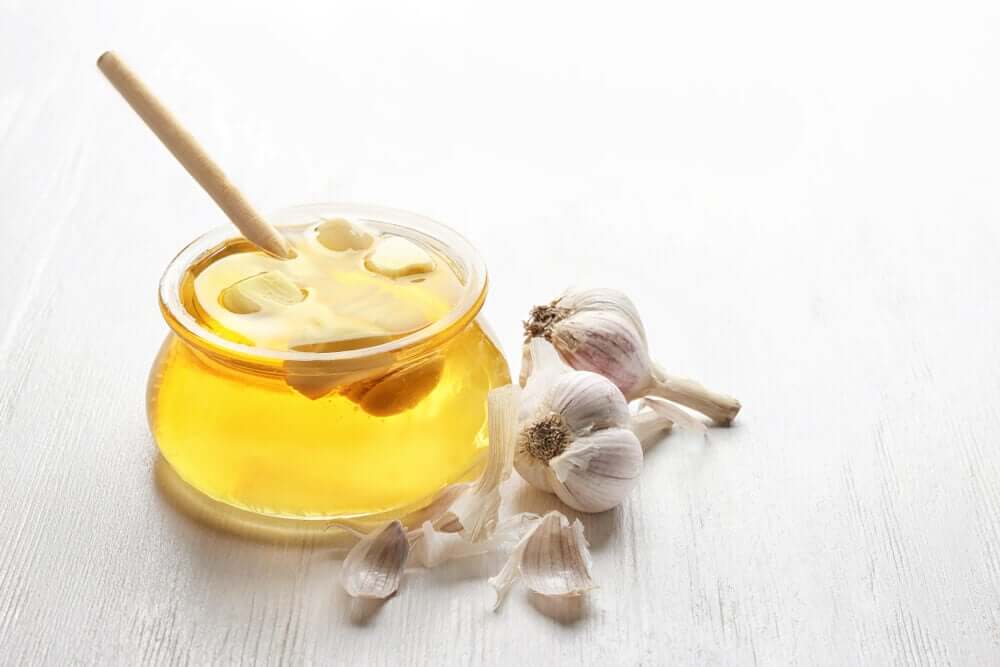 A jar of honey and garlic.