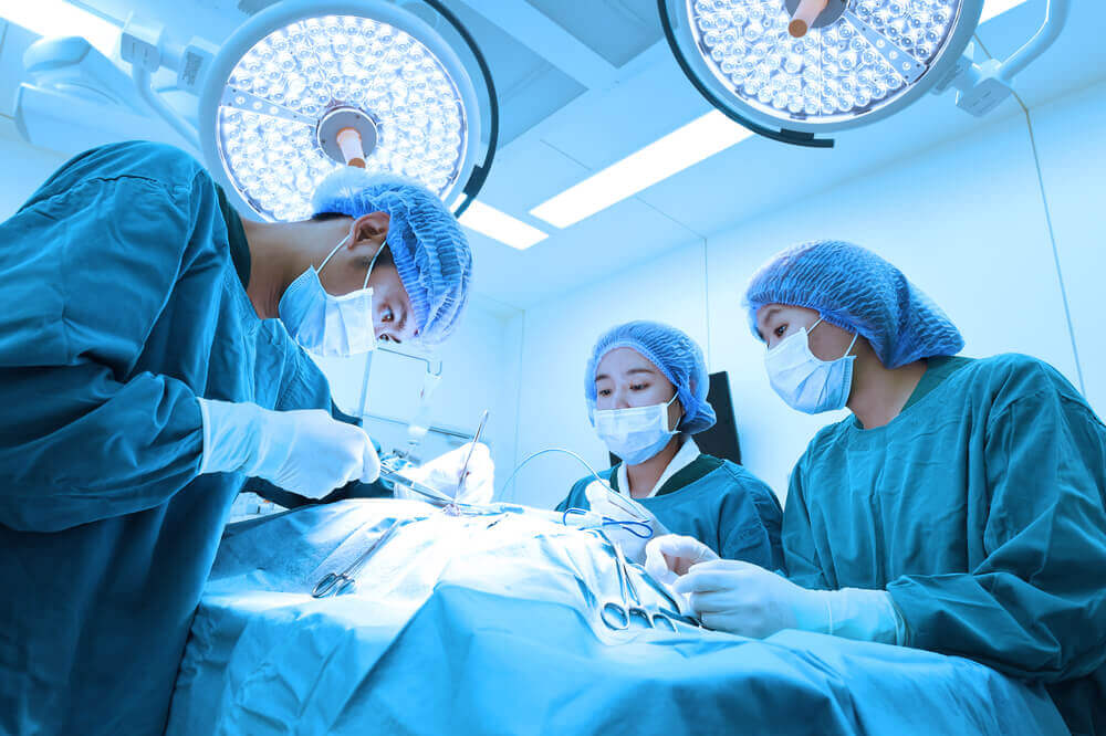 Surgeons performing surgery.