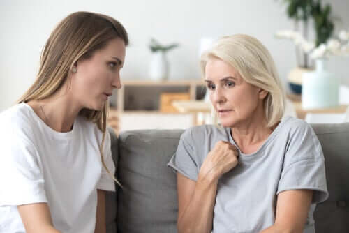 Two women talking.