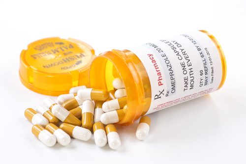 Übermäßige Einnahme von Omeprazol - Dose mit Medikamenten