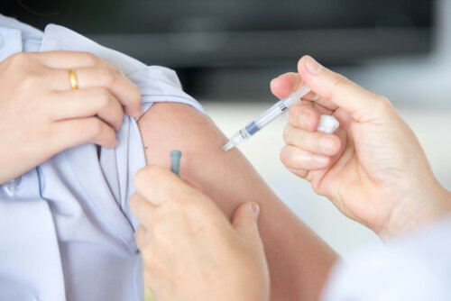A person receiving a vaccine.