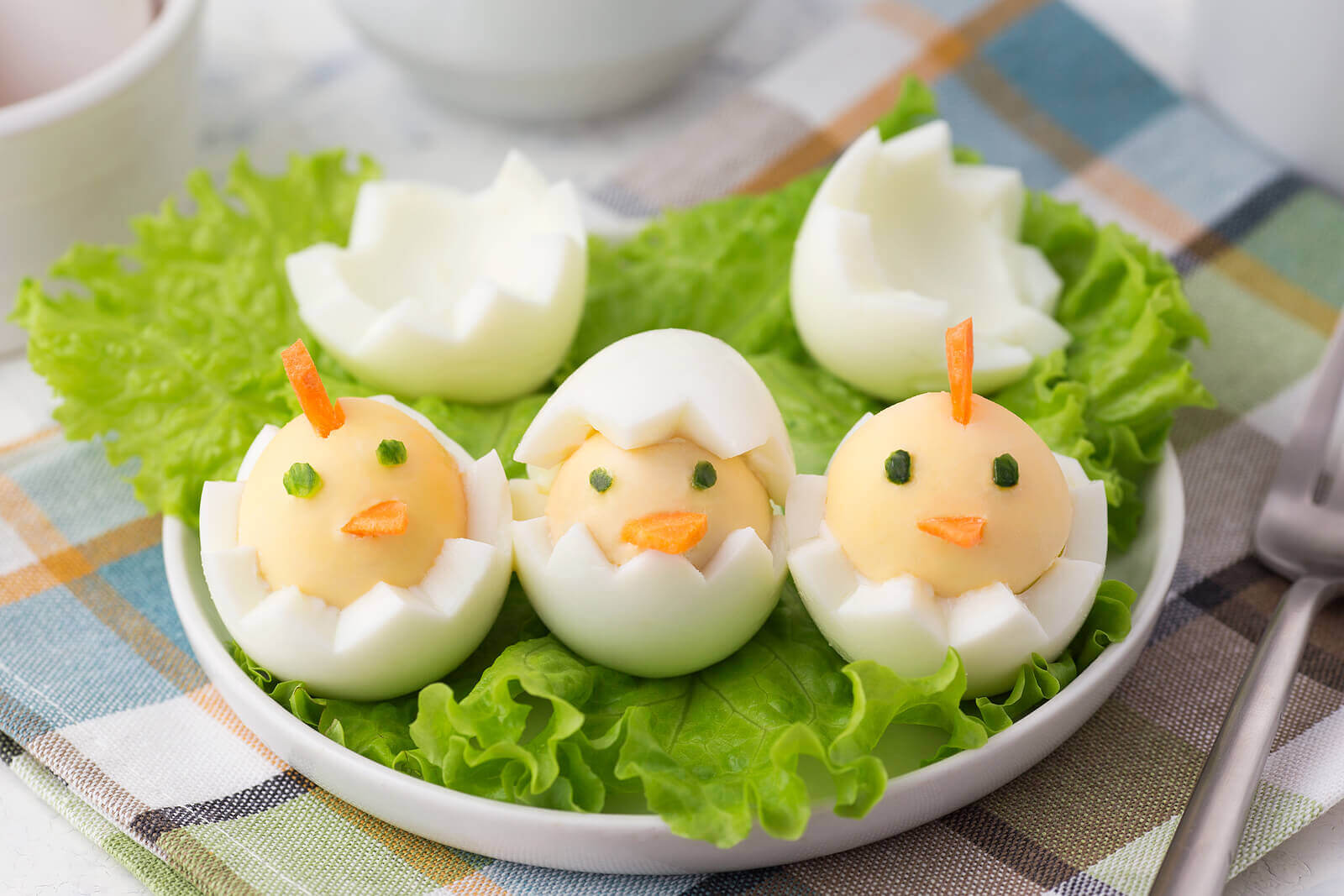Hard-boiled eggs that are decorated to look like newly-hatched chicks.