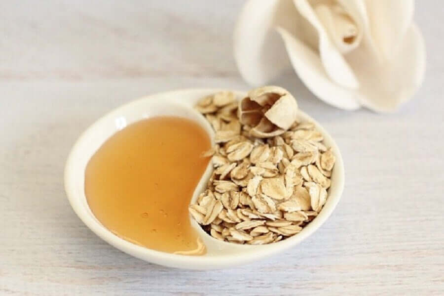 A dish containing honey and oats.