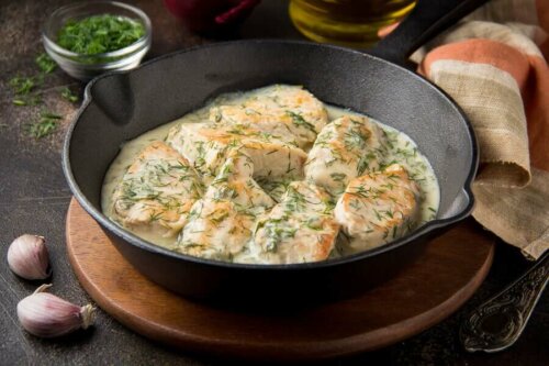 Cooked chicken in a cast iron skillet.