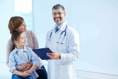 A woman and a girl with a doctor.