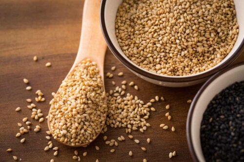 sesame seeds in a bowl with a spoon