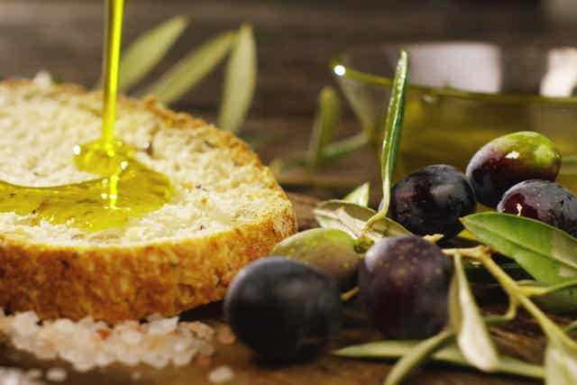Olive oil drizzled on bread.