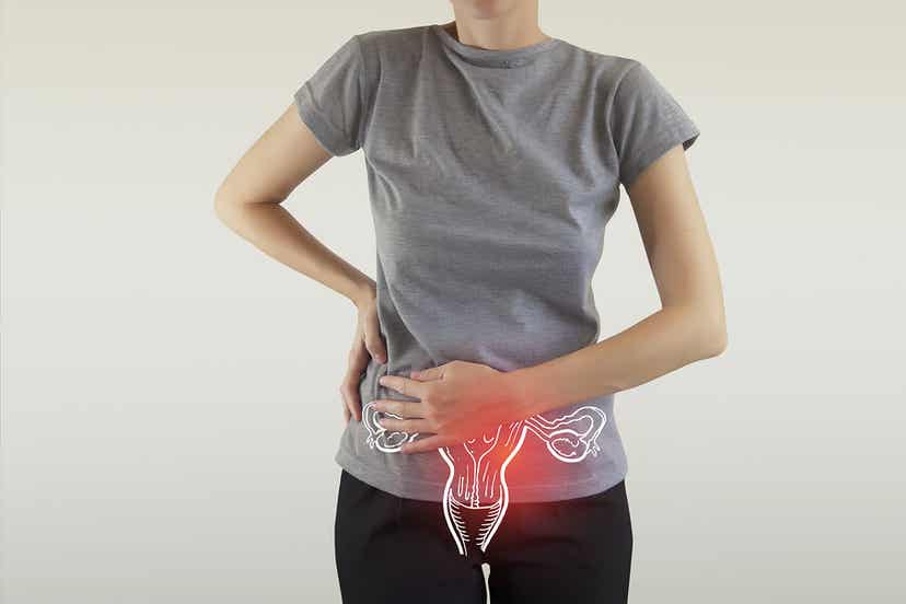 A woman experiencing lower abdominal pain.