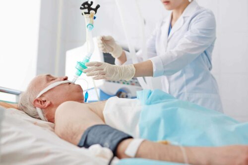 A nurse tending to a patient.
