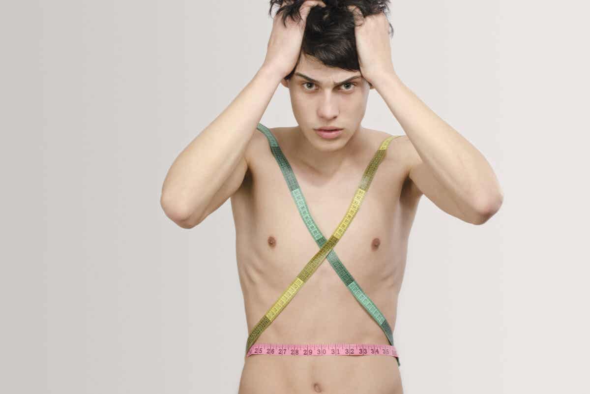 Negative body image: a very thin man with a measuring tape.