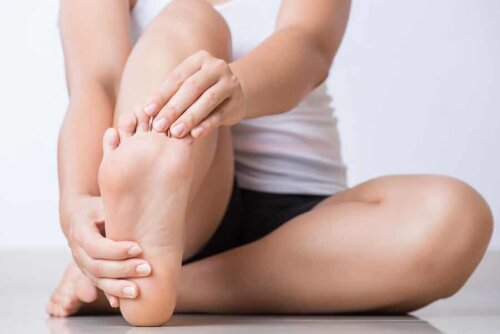 A person stretching their toes.